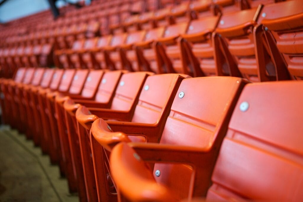 red row of seats at berlin stadium arena before concert doors open