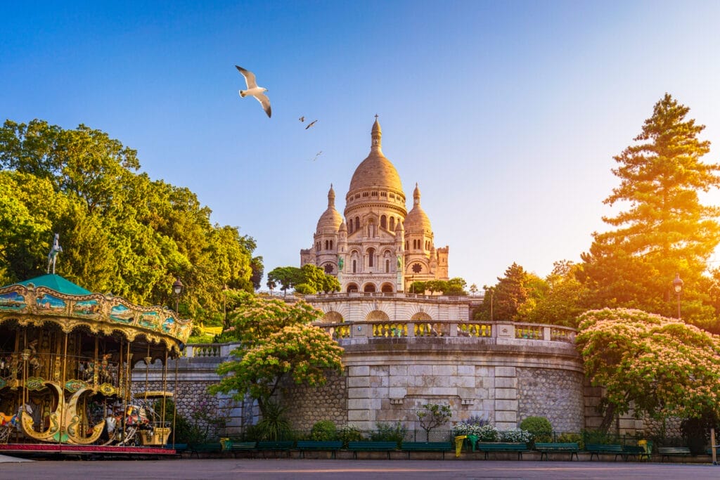 Basilica Sacre Coeur in Montmartre in Paris, France. The Basilica of the Sacred Heart (Sacre Coeur Basilica). Montmartre, Paris, France. Paris. Basilica Sacre-Coeur. On the hill Montmartre. Paris.